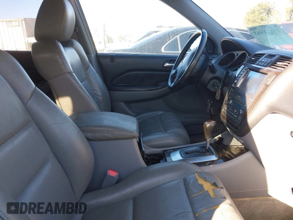 2004 Acura MDX Touring Pkg w/Navigation with VIN 2HNYD18834H511298, listed as a IAAI auction lot 41431863 with 246,274 mi miles. Bid and sale history available at carsss.com. Image 5.