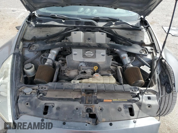 2014 Nissan 370Z z VIN JN1AZ4EH0EM630751, wystawiony jako Copart lot #51489825 z przebiegiem 125 107 mil mil oraz Czysty tytuł • Clean title. Historia ofert i sprzedaży dostępna na DreamBid. Obrazek 12.