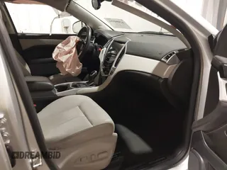 2016 Cadillac SRX Luxury Collection with VIN 3GYFNEE3XGS566210, listed as a IAAI auction lot 42094984 with 99,671 mi miles and . Bid and sale history available at DreamBid. Image 5.