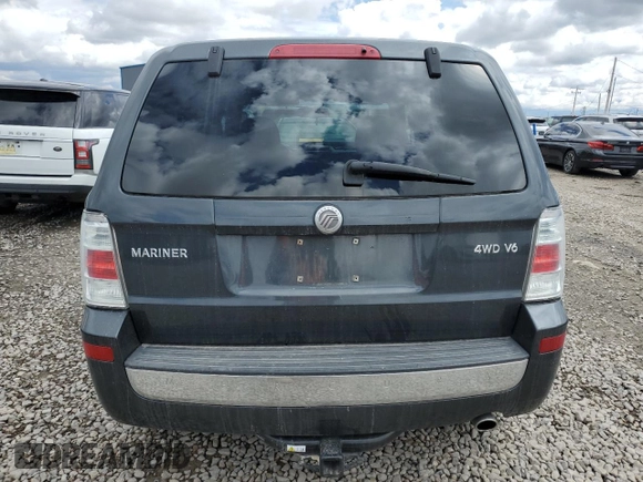 2008 Mercury Mariner z VIN 4M2CU91198KJ12447, wystawiony jako Copart lot #55319495 z przebiegiem 198 524 mil mil oraz Szkody całkowita. Historia ofert i sprzedaży dostępna na DreamBid. Obrazek 6.