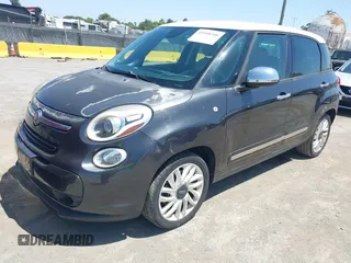 2014 FIAT 500L Lounge z VIN ZFBCFACH9EZ005710, wystawiony jako IAAI lot #42508508 z przebiegiem 96 652 mil mil oraz . Historia ofert i sprzedaży dostępna na DreamBid. Obrazek 2.