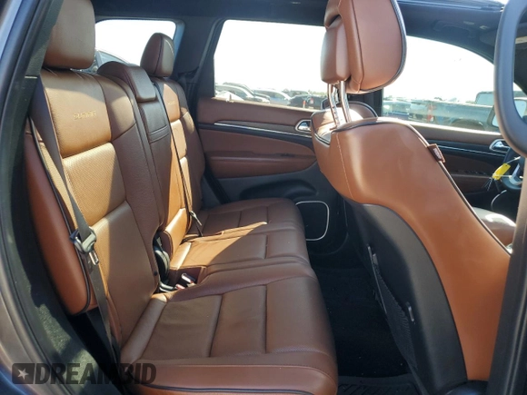 2019 Jeep Grand Cherokee Summit with VIN 1C4RJFJGXKC655979, listed as a Copart auction lot 73033194 with 121,720 mi miles and Salvage title. Bid and sale history available at DreamBid. Image 10.