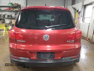 2013 Volkswagen Tiguan SE z VIN WVGBV3AX8DW092397, wystawiony jako Copart lot #51956225 z przebiegiem 138 901 mil mil oraz Szkoda całkowita • Salvage title. Historia ofert i sprzedaży dostępna na DreamBid. Obrazek 6.