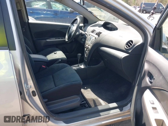 2009 Toyota Yaris with VIN JTDBT903X91300439, listed as a IAAI auction lot 42105998 with 195,880 mi miles. Bid and sale history available at carsss.com. Image 5.