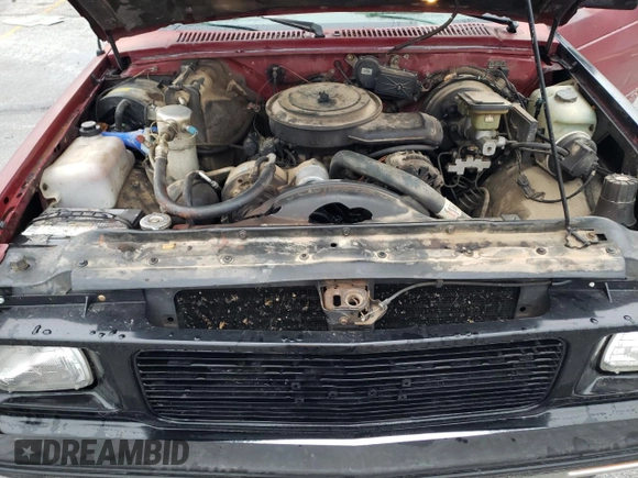 1993 GMC Sonoma z VIN 1GTCS19ZXP8503223, wystawiony jako Copart lot #86344214 z przebiegiem 175 849 mil mil oraz Szkody całkowita. Historia ofert i sprzedaży dostępna na DreamBid. Obrazek 12.