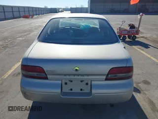 1997 Nissan Altima XE with VIN 1N4BU31D4VC221788, listed as a IAAI auction lot 41356945 with 136,931 mi miles. Bid and sale history available at carsss.com. Image 16.