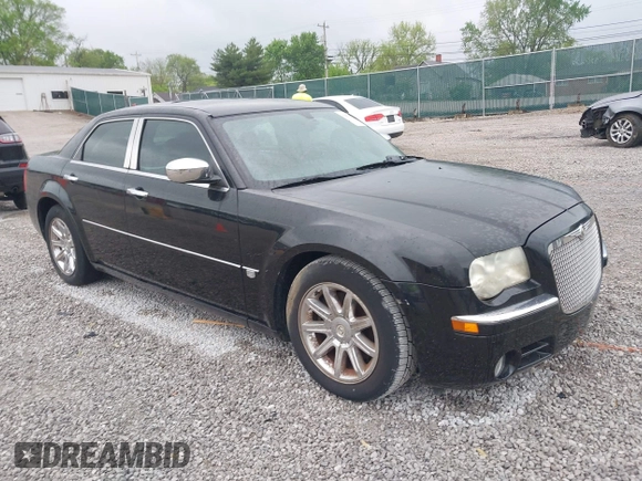 2005 Chrysler 300 with VIN 2C3JA63H05H608145, listed as a IAAI auction lot 42075474 with 167,098 mi miles. Bid and sale history available at carsss.com. Image 1.