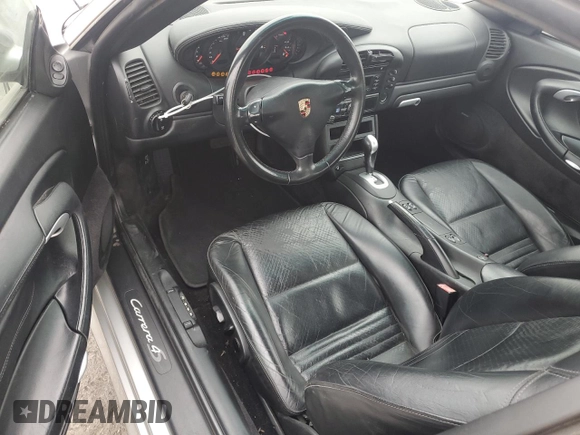 2004 Porsche 911 Carrera z VIN WP0AA29904S623031, wystawiony jako Copart lot #76551074 z przebiegiem 145 478 mil mil oraz Szkoda całkowita • Salvage title. Historia ofert i sprzedaży dostępna na DreamBid. Obrazek 8.