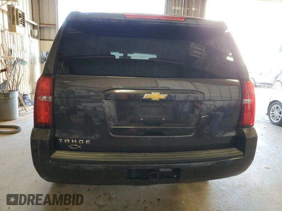 2015 Chevrolet Tahoe LS with VIN 1GNSCAKC5FR501801, listed as a Copart auction lot 50850645 with 112,896 mi miles and Salvage title. Bid and sale history available at DreamBid. Image 6.