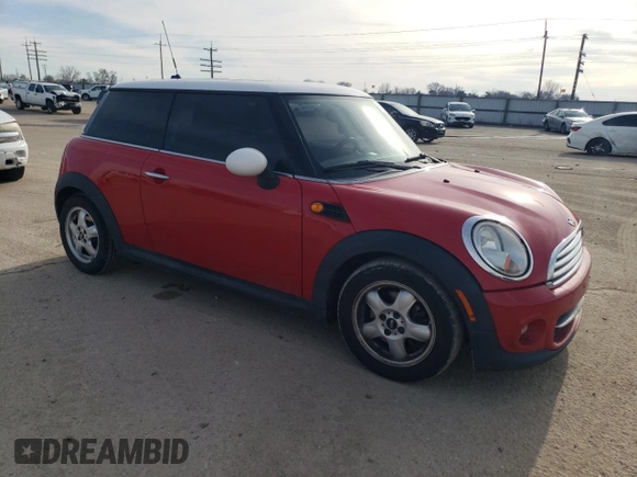 2011 MINI Hardtop with VIN WMWSU3C56BT251464, listed as a Copart auction lot 46182075 with 112,235 mi miles and Salvage Title. Bid and sale history available at DreamBid. Image 4.