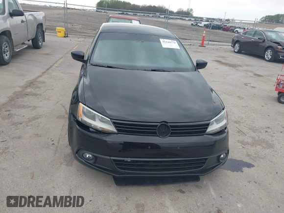 2014 Volkswagen Jetta SE z VIN 3VWD17AJ7EM388375, wystawiony jako IAAI lot #42144779 z przebiegiem 104 801 mil mil oraz . Historia ofert i sprzedaży dostępna na DreamBid. Obrazek 13.