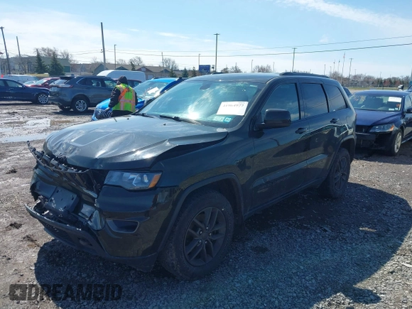 2016 Jeep Grand Cherokee Laredo z VIN 1C4RJFAG2GC454861, wystawiony jako IAAI lot #41964977 z przebiegiem 180 592 mil mil oraz . Historia ofert i sprzedaży dostępna na DreamBid. Obrazek 17.