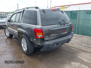 2003 Jeep Grand Cherokee Laredo z VIN 1J4GW48S73C545863, wystawiony jako IAAI lot #42222247 z przebiegiem 128 529 mil mil oraz . Historia ofert i sprzedaży dostępna na DreamBid. Obrazek 6.