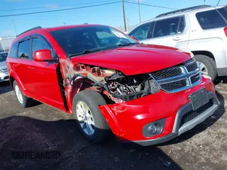 2017 Dodge Journey SXT z VIN 3C4PDDBG1HT577753, wystawiony jako IAAI lot #41855579 z przebiegiem 123 185 mil mil oraz . Historia ofert i sprzedaży dostępna na DreamBid. Obrazek 1.