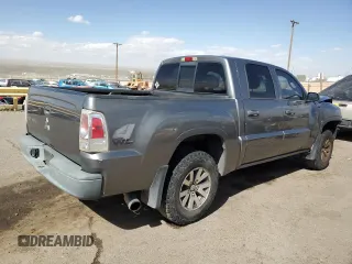 2008 Mitsubishi Raider LS z VIN 1Z7HT28KX8S620516, wystawiony jako Copart lot #76298034 z przebiegiem 185 938 mil mil oraz Szkoda całkowita • Salvage title. Historia ofert i sprzedaży dostępna na DreamBid. Obrazek 3.
