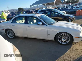 2007 Jaguar XJ with VIN SAJWA71B17SH12746, listed as a IAAI auction lot 41401422 with 99,735 mi miles. Bid and sale history available at carsss.com. Image 13.
