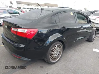 2013 Kia Rio LX with VIN KNADM4A34D6299708, listed as a IAAI auction lot 41926111 with 60,568 mi miles. Bid and sale history available at carsss.com. Image 4.