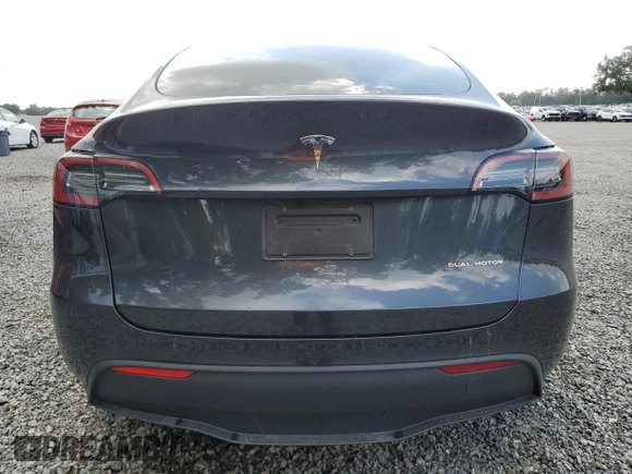 2024 Tesla Model Y Long Range with VIN 7SAYGDEE4RA285620, listed as a Copart auction lot 57883015 with 18,841 mi miles and Salvage title. Bid and sale history available at DreamBid. Image 6.