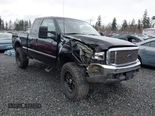 1999 Ford Super Duty F-250 XL with VIN 1FTNX21F2XEC99584, listed as a IAAI auction lot 41611098 with 424,263 mi miles. Bid and sale history available at carsss.com. Image 1.