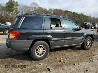 2003 Jeep Grand Cherokee Laredo with VIN 1J4GX48S43C609354, listed as a Copart auction lot 43924595 with 212,949 mi miles and Salvage Title. Bid and sale history available at carsss.com. Image 3.