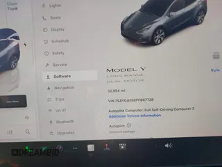2023 Tesla Model Y Long Range with VIN 7SAYGAEE8PF667728, listed as a IAAI auction lot 41839771 with 32,654 mi miles and . Bid and sale history available at DreamBid. Image 15.