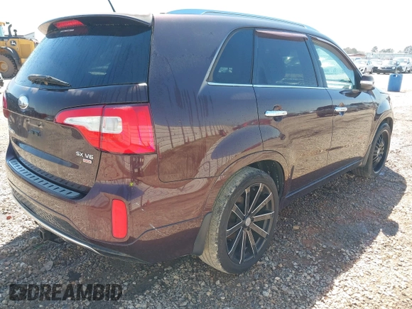 2014 Kia Sorento SX with VIN 5XYKW4A71EG478701, listed as a IAAI auction lot 41779045 with 197,896 mi miles. Bid and sale history available at carsss.com. Image 4.