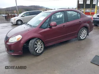 2008 Suzuki SX4 Sport z VIN JS2YC414985100007, wystawiony jako IAAI lot #41849082 z przebiegiem 157 595 mil mil oraz . Historia ofert i sprzedaży dostępna na DreamBid. Obrazek 2.