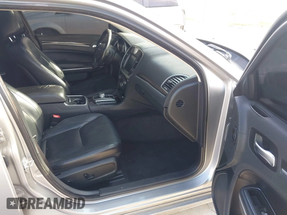 2016 Chrysler 300 Anniversary Edition with VIN 2C3CCAAG9GH211875, listed as a IAAI auction lot 42052083 with 209,251 mi miles and . Bid and sale history available at DreamBid. Image 5.