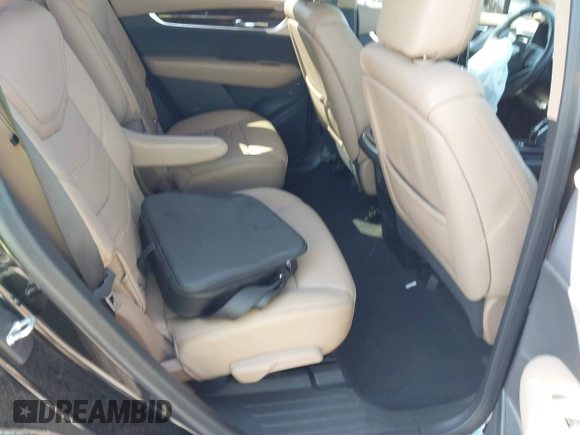2020 Cadillac XT6 FWD Premium Luxury z VIN 1GYKPERS0LZ232338, wystawiony jako IAAI lot #41845562 z przebiegiem 86 839 mil mil oraz . Historia ofert i sprzedaży dostępna na DreamBid. Obrazek 8.