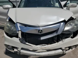 2010 Acura RDX z VIN 5J8TB1H20AA000483, wystawiony jako Copart lot #55855245 z przebiegiem 222 956 mil mil oraz Szkoda całkowita • Salvage title. Historia ofert i sprzedaży dostępna na DreamBid. Obrazek 11.