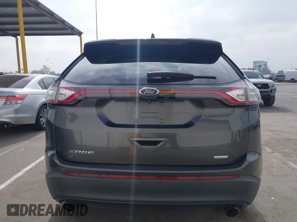 2017 Ford Edge SE z VIN 2FMPK3G97HBC65342, wystawiony jako IAAI lot #42610031 z przebiegiem 103 521 mil mil oraz . Historia ofert i sprzedaży dostępna na DreamBid. Obrazek 17.