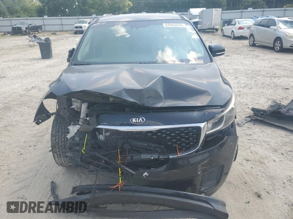 2018 Kia Sedona LX with VIN KNDMB5C17J6355646, listed as a Copart auction lot 67643374 with 106,261 mi miles and Salvage Title. Bid and sale history available at carsss.com. Image 5.