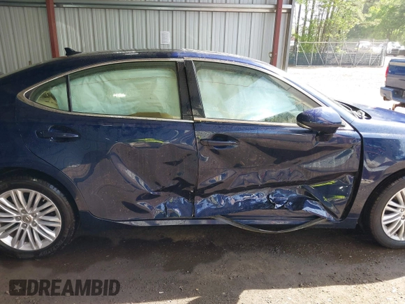 2014 Lexus ES 330 with VIN JTHBK1GG3E2101619, listed as a IAAI auction lot 42123874 with 50,980 mi miles and . Bid and sale history available at DreamBid. Image 13.