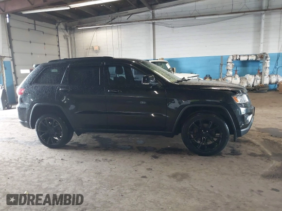 2015 Jeep Grand Cherokee Limited with VIN 1C4RJFBG4FC611156, listed as a IAAI auction lot 42021705 with 137,887 mi miles. Bid and sale history available at carsss.com. Image 13.