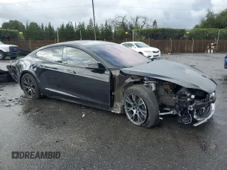 2024 Tesla Model S with VIN 5YJSA1E54RF536092, listed as a Copart auction lot 85934334 with 11,451 mi miles and Salvage title. Bid and sale history available at DreamBid. Image 4.
