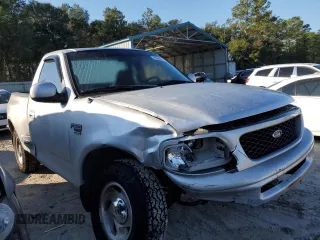 1998 Ford F-150 with VIN 2FTZF07W8WCA96137, listed as a Copart auction lot 82886074 with 181,690 mi miles and Salvage title. Bid and sale history available at DreamBid. Image 4.