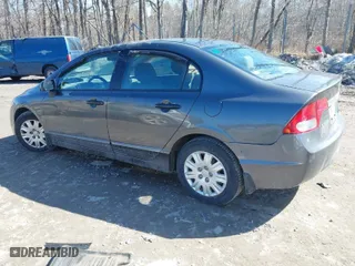 2010 Honda Civic Sdn DX-VP with VIN 2HGFA1F31AH571803, listed as a IAAI auction lot 41769105 with 57,187 mi miles. Bid and sale history available at carsss.com. Image 3.
