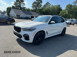 2020 BMW X5 sDrive40i with VIN 5UXCR4C02LLW64999, listed as a Copart auction lot 65563555 with 84,101 mi miles and Clean title. Bid and sale history available at DreamBid. Image 1.