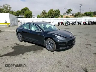 2020 Tesla Model 3 Standard Range Plus z VIN 5YJ3E1EA9LF606716, wystawiony jako Copart lot #52807955 z przebiegiem 40 393 mil mil oraz Szkoda całkowita • Salvage title. Historia ofert i sprzedaży dostępna na DreamBid. Obrazek 13.