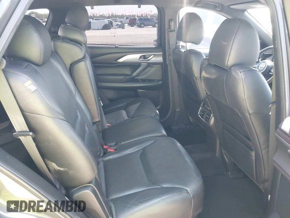 2016 Mazda CX-9 Grand Touring with VIN JM3TCADY5G0120033, listed as a IAAI auction lot 42248488 with 150,044 mi miles and . Bid and sale history available at DreamBid. Image 8.
