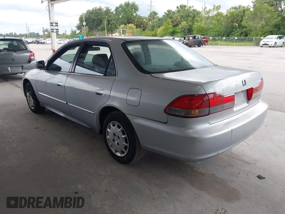 2001 Honda Accord LX with VIN 1HGCG55401A063548, listed as a IAAI auction lot 42651792 with 215,058 mi miles and . Bid and sale history available at DreamBid. Image 3.