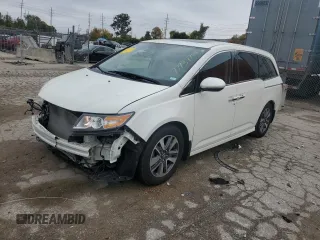 2016 Honda Odyssey Touring Elite with VIN 5FNRL5H92GB016968, listed as a Copart auction lot 77739744 with 80,983 mi miles and Salvage title. Bid and sale history available at DreamBid. Image 1.