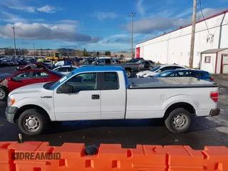 2014 Ford F-150 XL with VIN 1FTFX1CF4EKG53325, listed as a IAAI auction lot 41060015 with 216,554 mi miles. Bid and sale history available at carsss.com. Image 14.