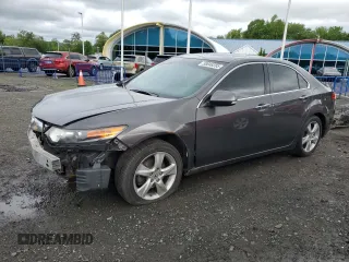 2010 Acura TSX z VIN JH4CU2F64AC040590, wystawiony jako Copart lot #58048285 z przebiegiem 212 113 mil mil oraz Szkody całkowita. Historia ofert i sprzedaży dostępna na DreamBid. Obrazek 1.
