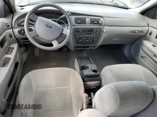 2006 Ford Taurus SE с VIN 1FAFP53U96A187491, выставлен на аукционе Copart как лот 55109005 с пробегом 121 856 миль миль и Списание • Salvage title. История ставок и продаж доступна на DreamBid. Изображение 8.
