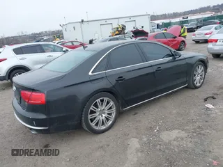 2012 Audi A8 с VIN WAUAVAFD0CN035731, выставлен на аукционе IAAI как лот 41286022 с пробегом 82 835 миль миль и . История ставок и продаж доступна на DreamBid. Изображение 4.