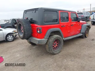 2020 Jeep Wrangler Unlimited Willys with VIN 1C4HJXDN8LW213889, listed as a IAAI auction lot 41561034 with 97,489 mi miles and . Bid and sale history available at DreamBid. Image 4.