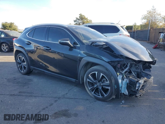 2021 Lexus UX 200 with VIN JTHX3JBH3M2032478, listed as a Copart auction lot 80309824 with 51,207 mi miles and Salvage title. Bid and sale history available at DreamBid. Image 4.