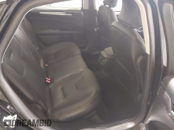 2016 Ford Fusion Titanium with VIN 3FA6P0K96GR197709, listed as a IAAI auction lot 40977902 with 135,259 mi miles. Bid and sale history available at carsss.com. Image 8.