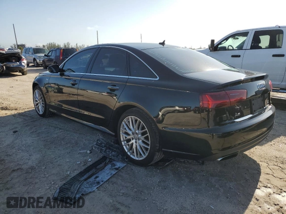 2016 Audi A6 Prestige with VIN WAUHGAFC9GN000885, listed as a Copart auction lot 53656633 with 98,685 mi miles and Salvage title. Bid and sale history available at DreamBid. Image 2.